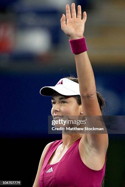 Ana Ivanovic of Serbia celebrates her win over Marion Bartoli of France during day four of the 2010 China Open at the National Tennis Center on...