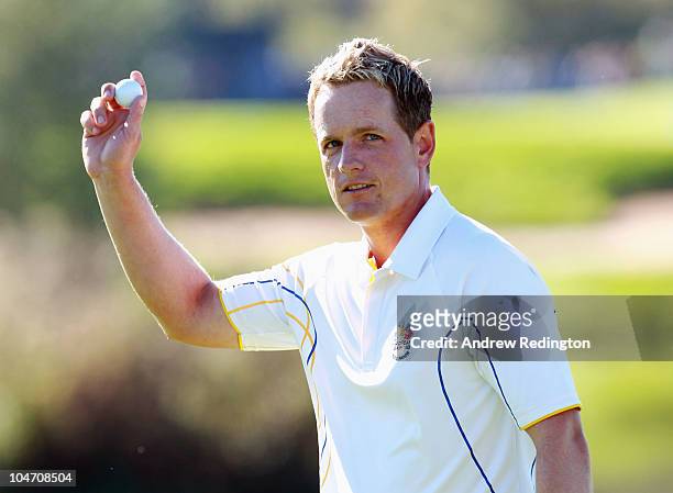 Luke Donald of Europe acknowledges the crowd on the 11th green in the singles matches during the 2010 Ryder Cup at the Celtic Manor Resort on October...