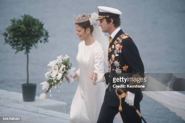 King Carl Gustaf XVI of Sweden marries Silvia Sommerlath at Stockholm Cathedral on June 19, 1976.
