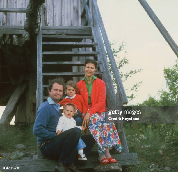 King Carl Gustaf XVI and Queen Silvia of Sweden with their children Prince Carl Philip and Crown Princess Victoria of Sweden at Solliden Castle on...