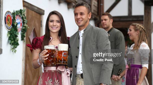 Rafinha and his girlfriend Fernanda Bellafronte attend the Oktoberfest beer festival at Kaefer Wiesenschaenke tent at Theresienwiese on October 7,...