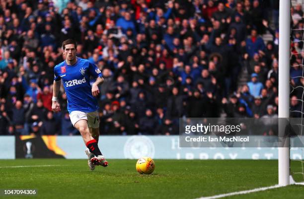 Ryan Kent of Rangers scores his team's first goal during the Scottish Ladbrokes Premiership match between Rangers and Hearts at Ibrox Stadium on...