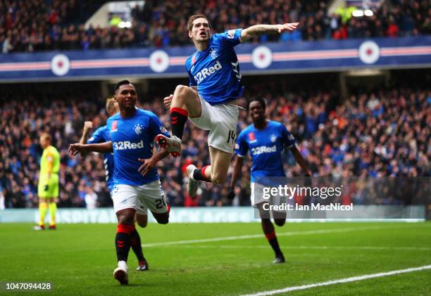 Ryan Kent of Rangers celebrates as he scores his team's first goal with team mates during the Scottish Ladbrokes Premiership match between Rangers...