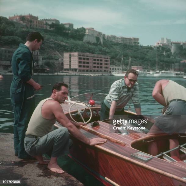 Prince Rainier III of Monaco prepares his boat in Monte Carlo harbour in 1958.