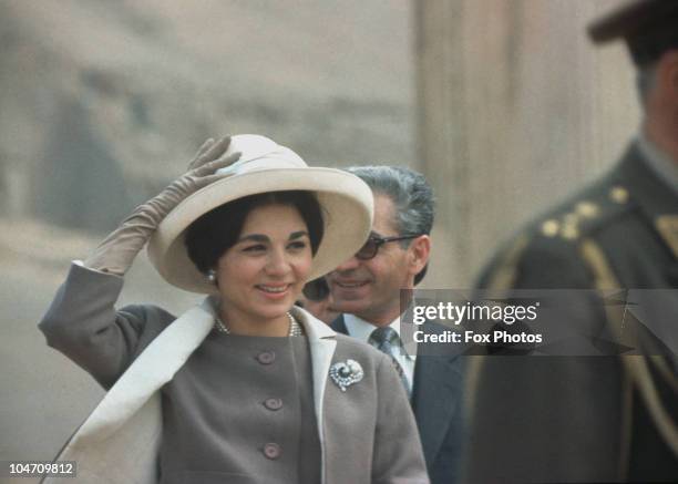 Muhammad Reza Shah Pahlavi of Iran and his wife Empress Farah Pahlavi on a visit to the ancient ruins at Persepolis in March 1961 .