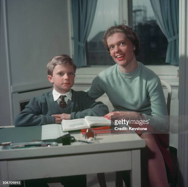 Crown Prince Carl Gustaf and his sister Princess Birgitta of Sweden in the Royal Palace, Stockholm in April 1956 .
