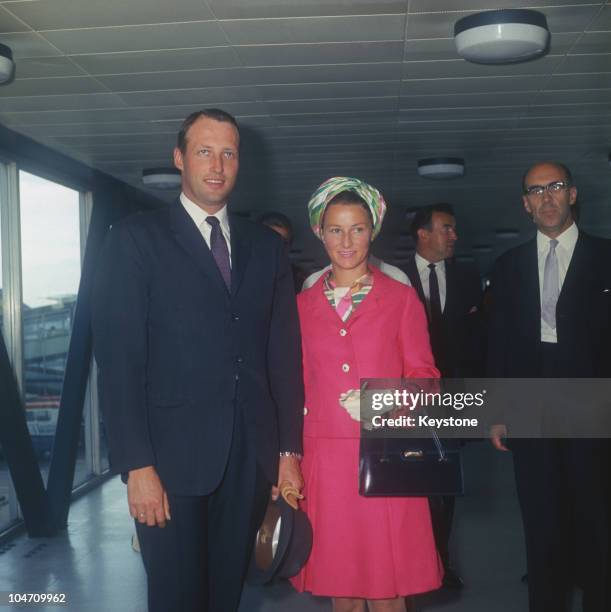 Crown Prince Harald and Princess Sonja of Norway arrive at Heathrow Airport in London, England in 1969.