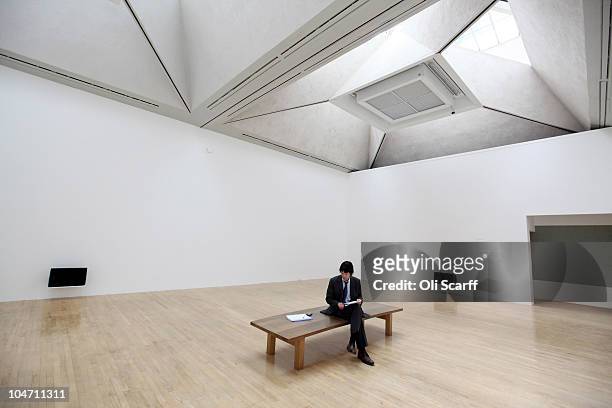 Man listens to a sound installation by Susan Philipsz entitled 'Lowlands' which has been shortlisted for the Turner Prize 2010 and displayed in the...