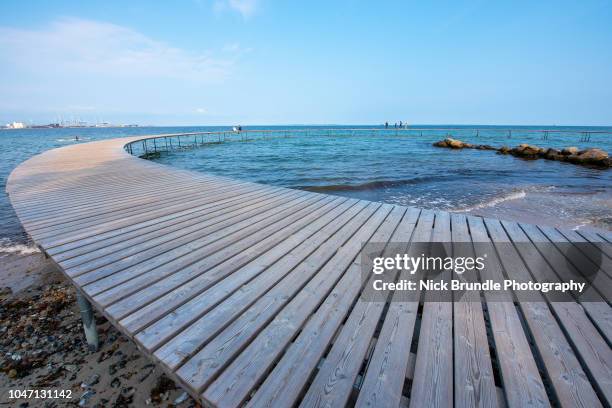 the infinity bridge, aarhus, denmark. - aarhus stock-fotos und bilder