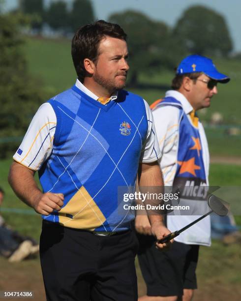 Graeme McDowell of Europe celebrates making par on the 14th hole in the singles matches during the 2010 Ryder Cup at the Celtic Manor Resort on...