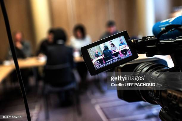 Grace, the wife of the missing Interpol president Meng Hongwey, talks to journalists on October 7, 2018 in Lyon during a press conference during...