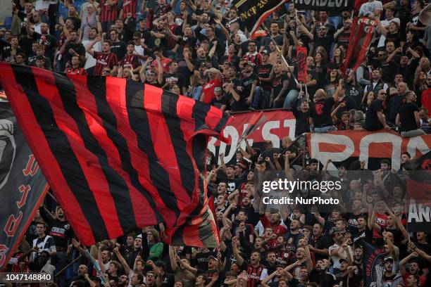 Fans show their support AC Milan during the serie A match between AC Milan and Chievo Verona at Stadio Giuseppe Meazza on October 7, 2018 in Milan,...