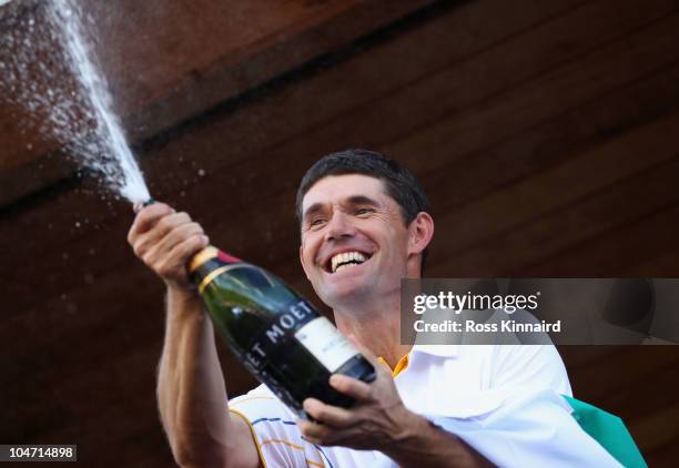 Padraig Harrington of Europe sprays champagne on the balcony of the clubhouse following Europe's victory during the 2010 Ryder Cup at the Celtic...