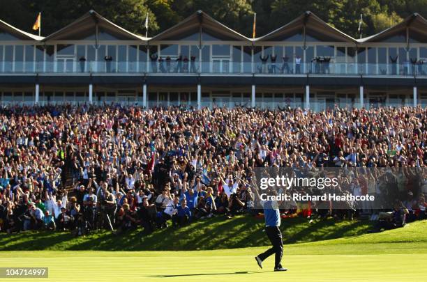 Graeme McDowell of Europe celebrates his birdie putt on the 16th green in the singles matches during the 2010 Ryder Cup at the Celtic Manor Resort on...