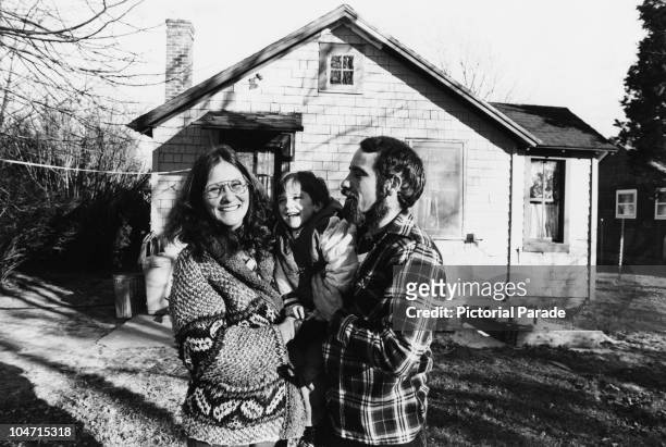 American actress Linda Lovelace with her husband Larry Marchiano and their son Dominic outside their Long Island home, 1980. Lovelace starred in a...