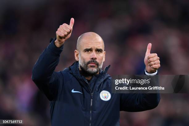 Josep Guardiola, Manager of Manchester City acknowledges the fans after the Premier League match between Liverpool FC and Manchester City at Anfield...