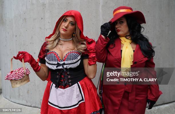 Comic Con fans in costume arrive for the final day of the 2018 New York Comic-Con at the Jacob Javits Center on October 7, 2018. - The four-day event...