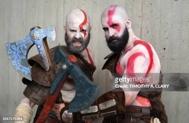 Comic Con fans in costume arrive for the final day of the 2018 New York Comic-Con at the Jacob Javits Center on October 7, 2018. - The four-day event...