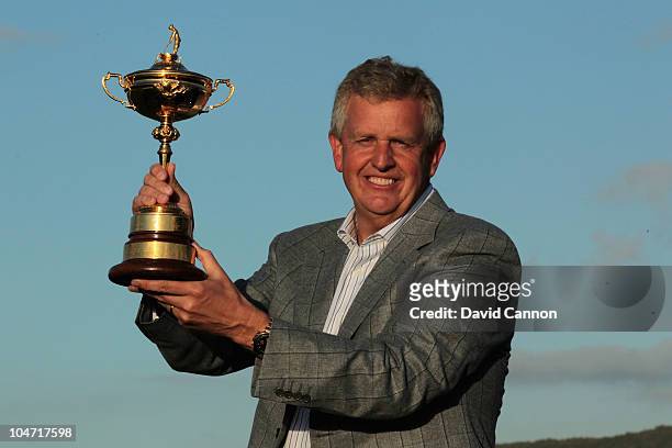 European Team Captain Colin Montgomerie poses with the Ryder Cup following Europe's 14.5 to 13.5 victory over the USA at the 2010 Ryder Cup at the...