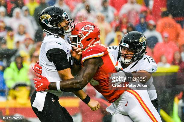 Justin Houston of the Kansas City Chiefs attempts to sack Blake Bortles of the Jacksonville Jaguars during the first quarter of the game at Arrowhead...
