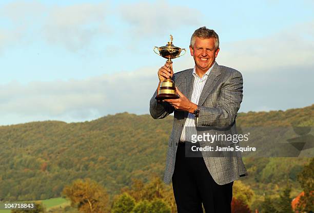 European Team Captain Colin Montgomerie poses with the Ryder Cup following Europe's 14.5 to 13.5 victory over the USA at the 2010 Ryder Cup at the...