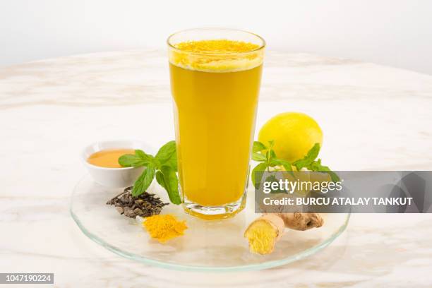 lemon juice with honey, ginger, mint and turmeric - stevia stock pictures, royalty-free photos & images