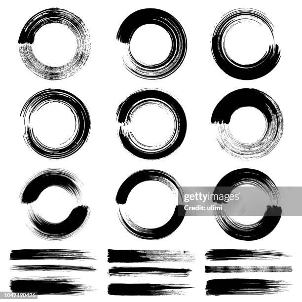 circle brush strokes, grunge design elements - paint brushes stock illustrations