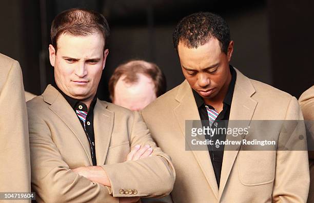 Team USA members Zach Johnson and Tiger Woods show dejection during the closing ceremonies of the 2010 Ryder Cup at the Celtic Manor Resort on...