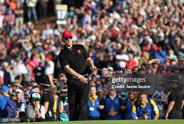 Hunter Mahan of the USA watches his pitch shot on the 17th hole in the singles matches during the 2010 Ryder Cup at the Celtic Manor Resort on...