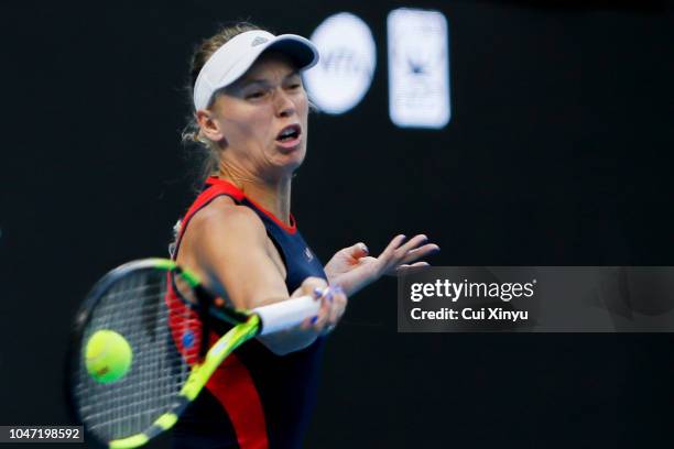 Caroline Wozniacki of Denmark hits a return during the Women's Singles Finals match against Anastasija Sevastova of Latvia on day nine of the 2018...