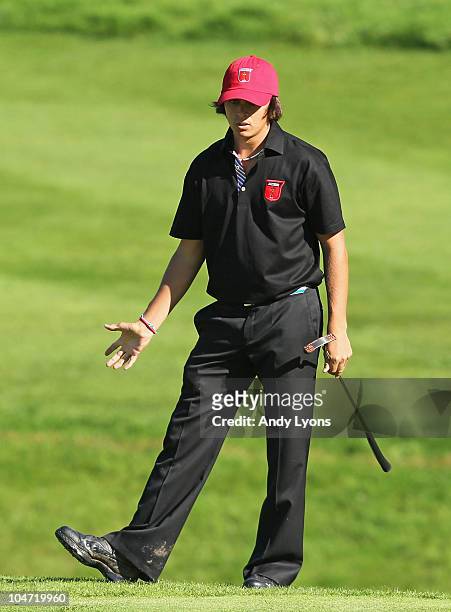 Rickie Fowler of the USA watches a putt in the singles matches during the 2010 Ryder Cup at the Celtic Manor Resort on October 4, 2010 in Newport,...