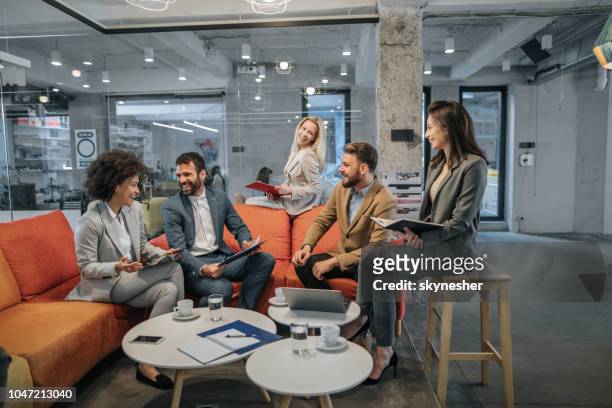 cheerful business team talking on a meeting at casual office. - report fun stock pictures, royalty-free photos & images