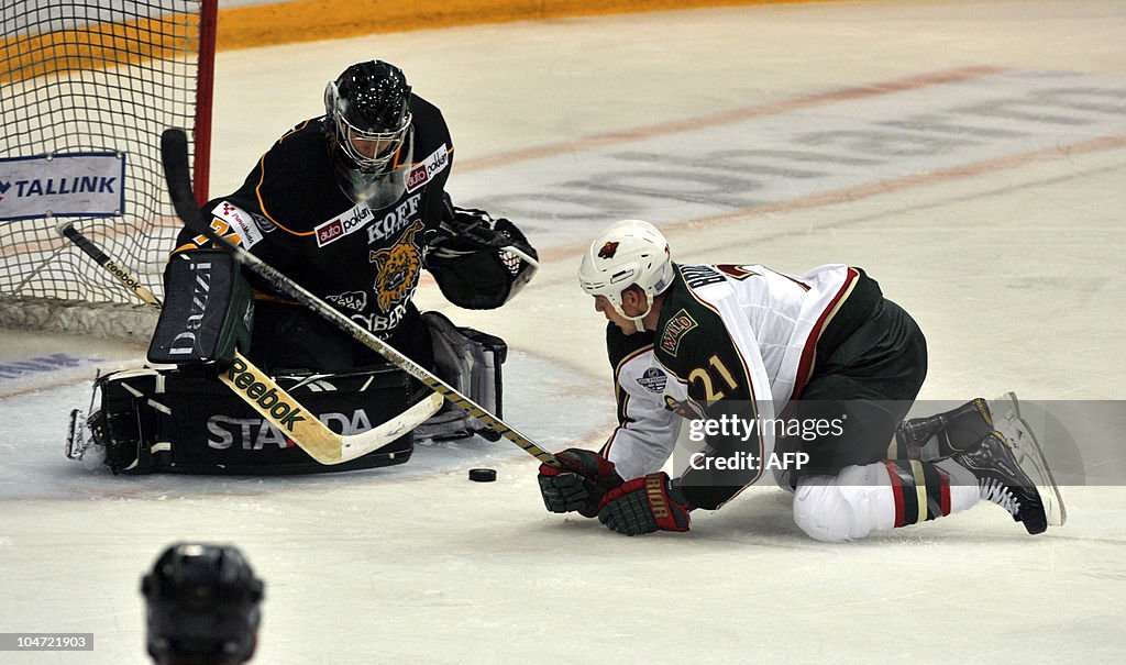 Ilves goalkeeper Sami Aittokallio (L) fa