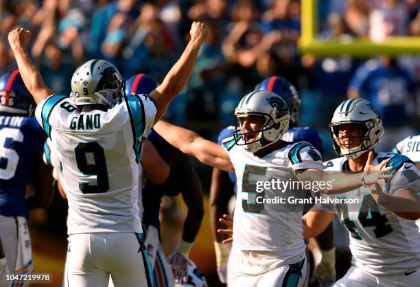 Kicker Graham Gano celebrates with Michael Palardy and J.J. Jansen of the Carolina Panthers after his game-wining 63-yard field goal against the New...