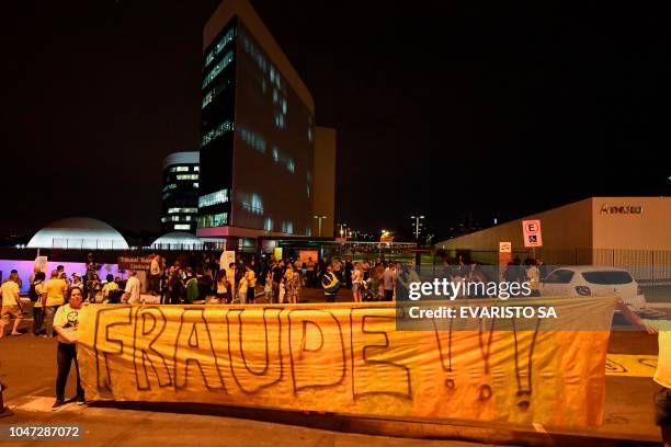 Supporters of Brazilian presidential candidate for the Social Liberal Party Jair Bolsonaro protest for alleged fraud, outside the Supreme Electoral...