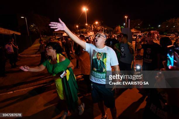 Supporters of Brazilian presidential candidate for the Social Liberal Party Jair Bolsonaro protest for alleged fraud, outside the Supreme Electoral...