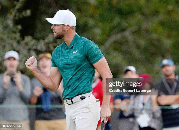 Kevin Tway putts in to win on a third hole sudden death playoff against Ryan Moore on the 10th green during the final round of the Safeway Open at...