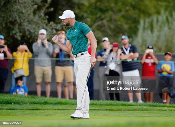 Kevin Tway putts in to win on a third hole sudden death playoff against Ryan Moore on the 10th green during the final round of the Safeway Open at...
