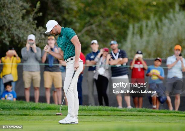 Kevin Tway putts in to win on a third hole sudden death playoff against Ryan Moore on the 10th green during the final round of the Safeway Open at...