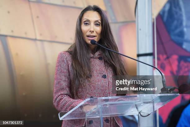 Vicky Cornell speaks during the public unveiling ceremony of a statue of her husband Soundgarden singer Chris Cornell at MoPOP on October 7, 2018 in...