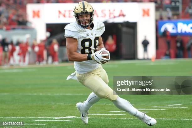Tight end Brycen Hopkins of the Purdue Boilermakers runs after a catch against the Nebraska Cornhuskers at Memorial Stadium on September 29, 2018 in...