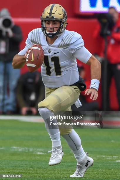 Quarterback David Blough of the Purdue Boilermakers runs against the Nebraska Cornhuskers at Memorial Stadium on September 29, 2018 in Lincoln,...