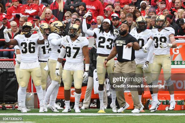 Players of the Purdue Boilermakers celebrate on the sidelines during the first half against the Nebraska Cornhuskers at Memorial Stadium on September...
