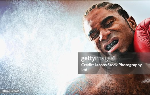 African American Boxer Getting Hit High-Res Stock Photo - Getty Images