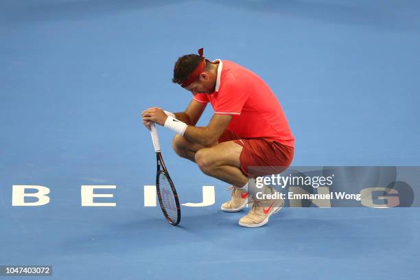 Juan Martin Del Potro of Argentina reacts during his Men's Singles Finals match against Nikoloz Basilashvili of Georgia in the 2018 China Open at the...