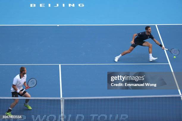 Oliver Marach of Austria and Mate Pavic of Croatia in action during their Men's doubles final match against Lukasz Kubot of Poland and Marcelo Melo...