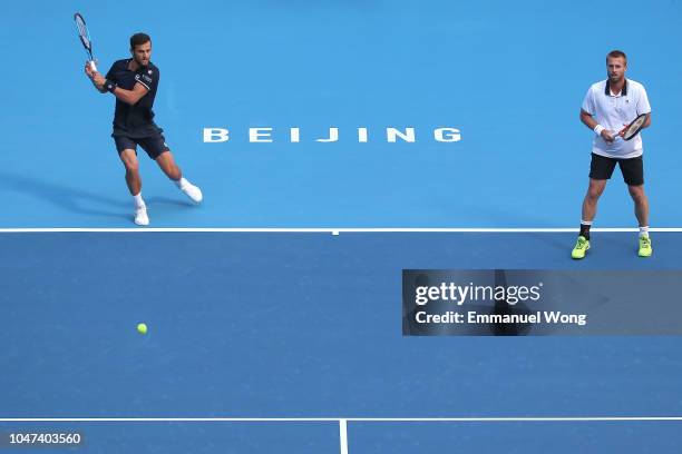 Oliver Marach of Austria and Mate Pavic of Croatia in action during their Men's doubles final match against Lukasz Kubot of Poland and Marcelo Melo...