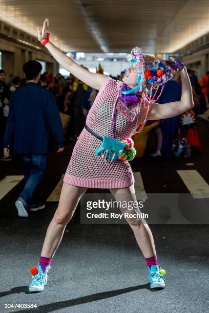 Fan cosplays as Bulma from Dragon Ball Z during the 2018 New York Comic-Con at Javits Center on October 7, 2018 in New York City.