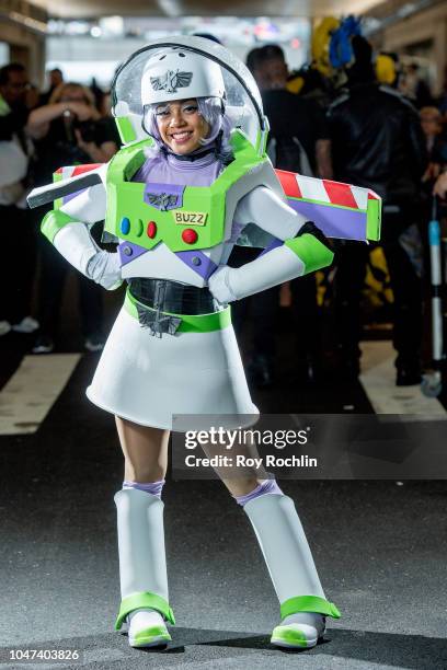 Fan cosplays as Buzz Lightyear from Toy Story during the 2018 New York Comic-Con at Javits Center on October 7, 2018 in New York City.