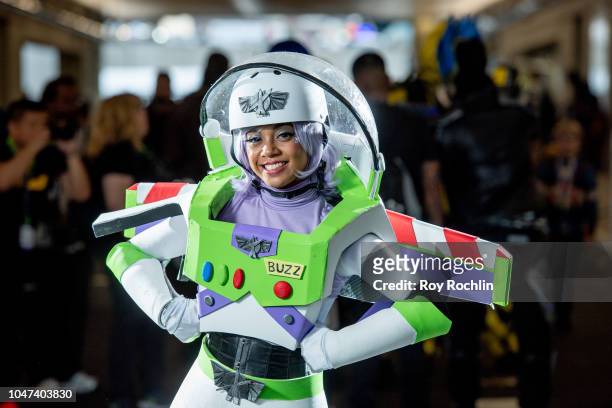 Fan cosplays as Buzz Lightyear from Toy Story during the 2018 New York Comic-Con at Javits Center on October 7, 2018 in New York City.